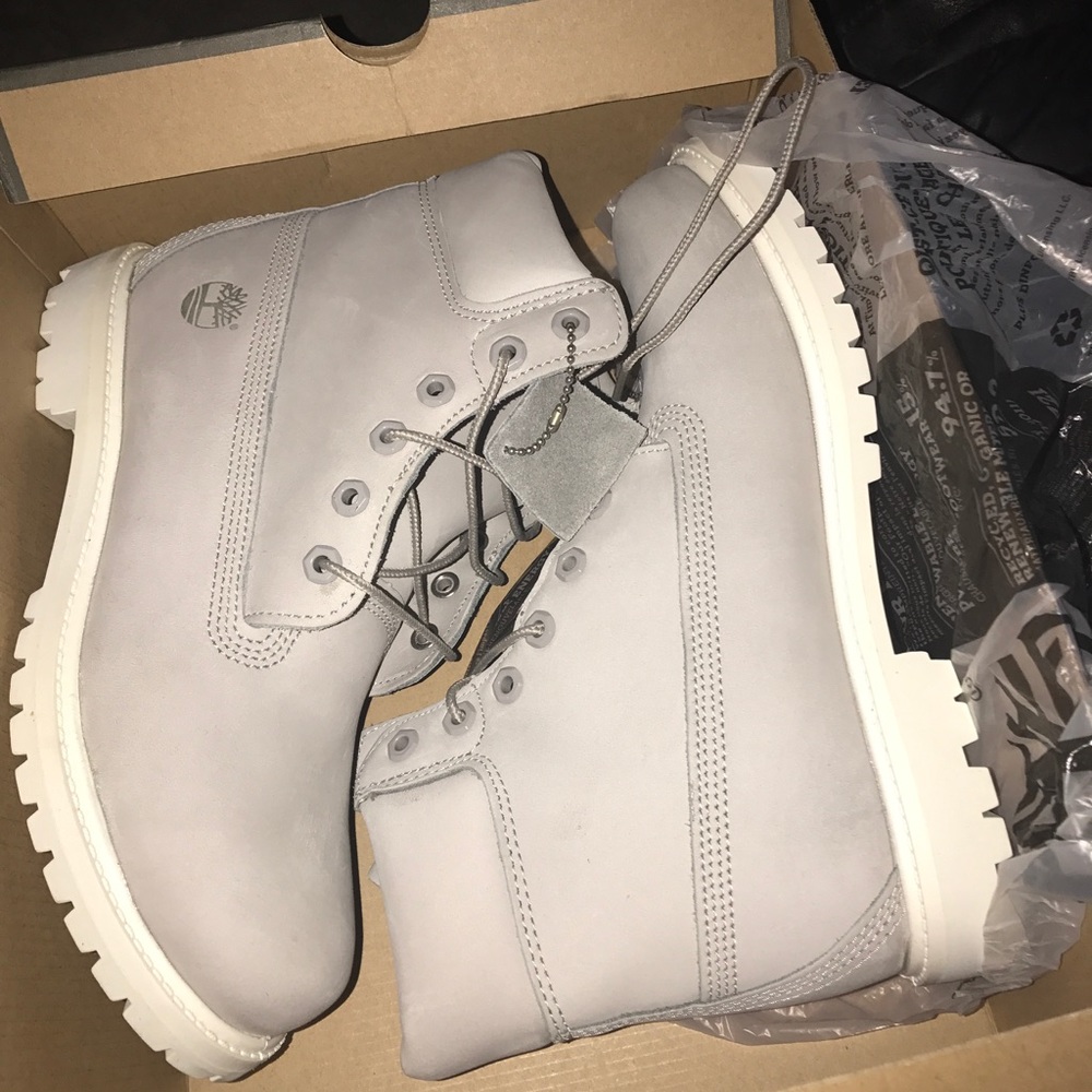 Womans Gray and White Timberlands.