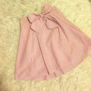 Seersucker high-waisted skirt with front bow-tie.