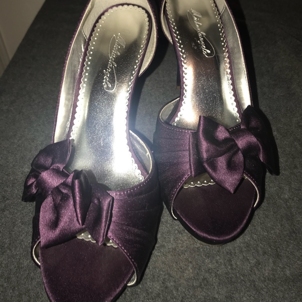 Plum satin pumps