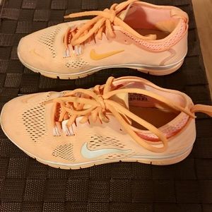 Nike size 6. Color is light orange.