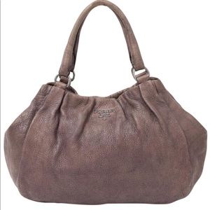 Distressed soft leather authentic PRADA hobo bag.