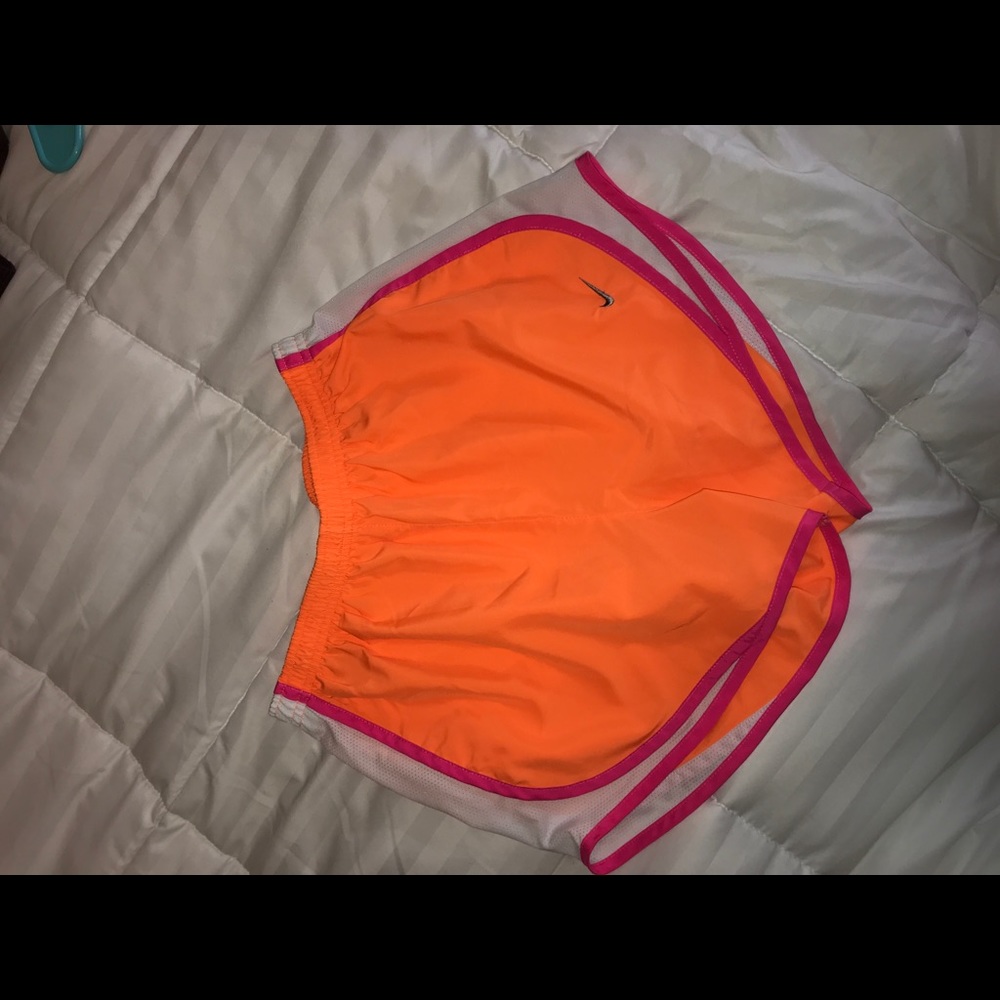 orange nike running shorts