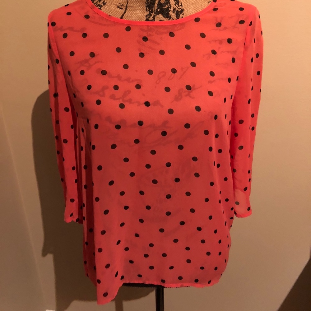 Pink and black polka dot blouse