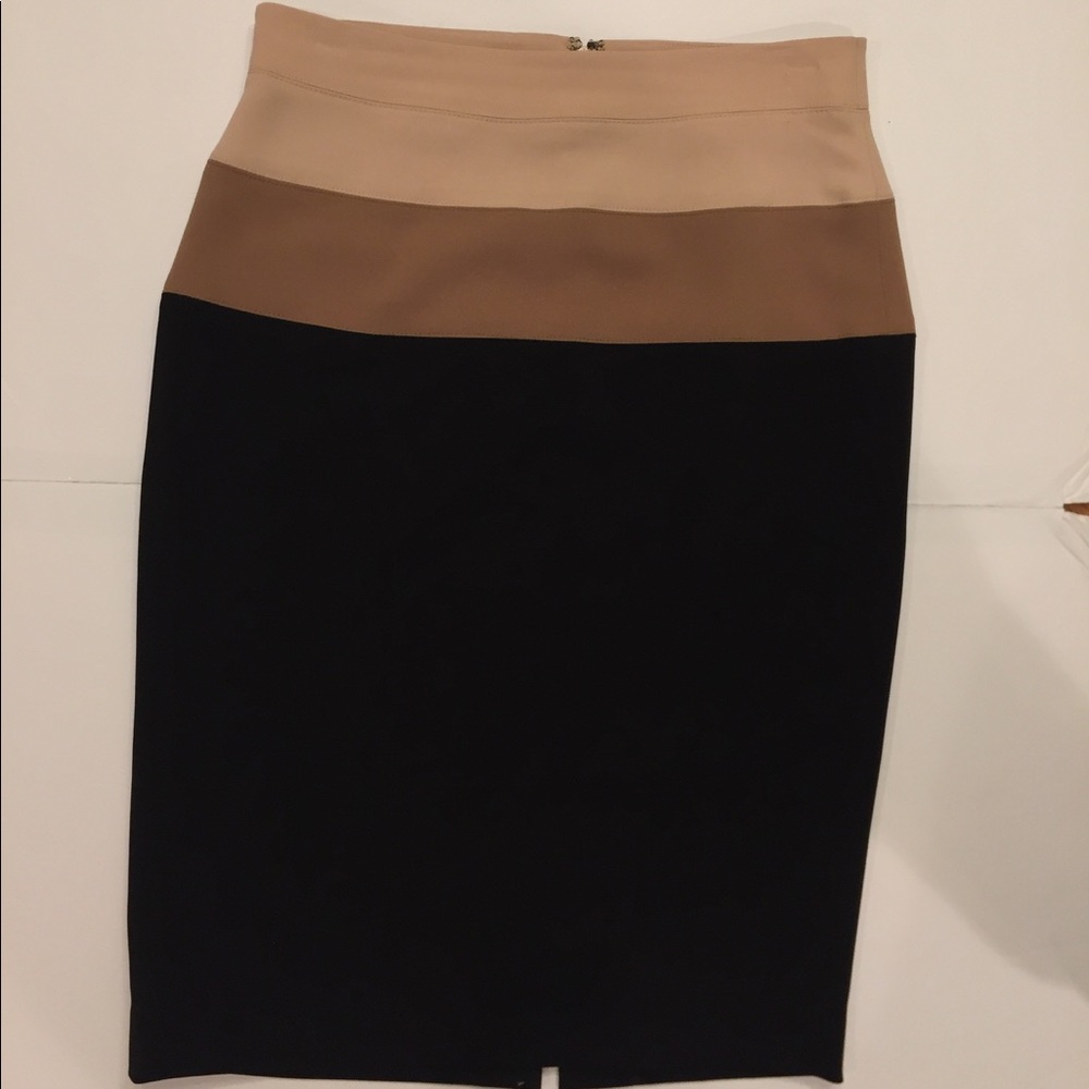 Cream colored top of skirt