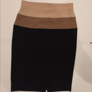 Cream colored top of skirt