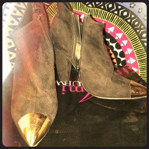 Pointy black booties