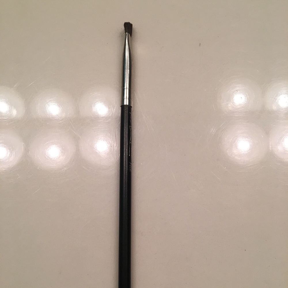 Angled tip makeup brush.#266