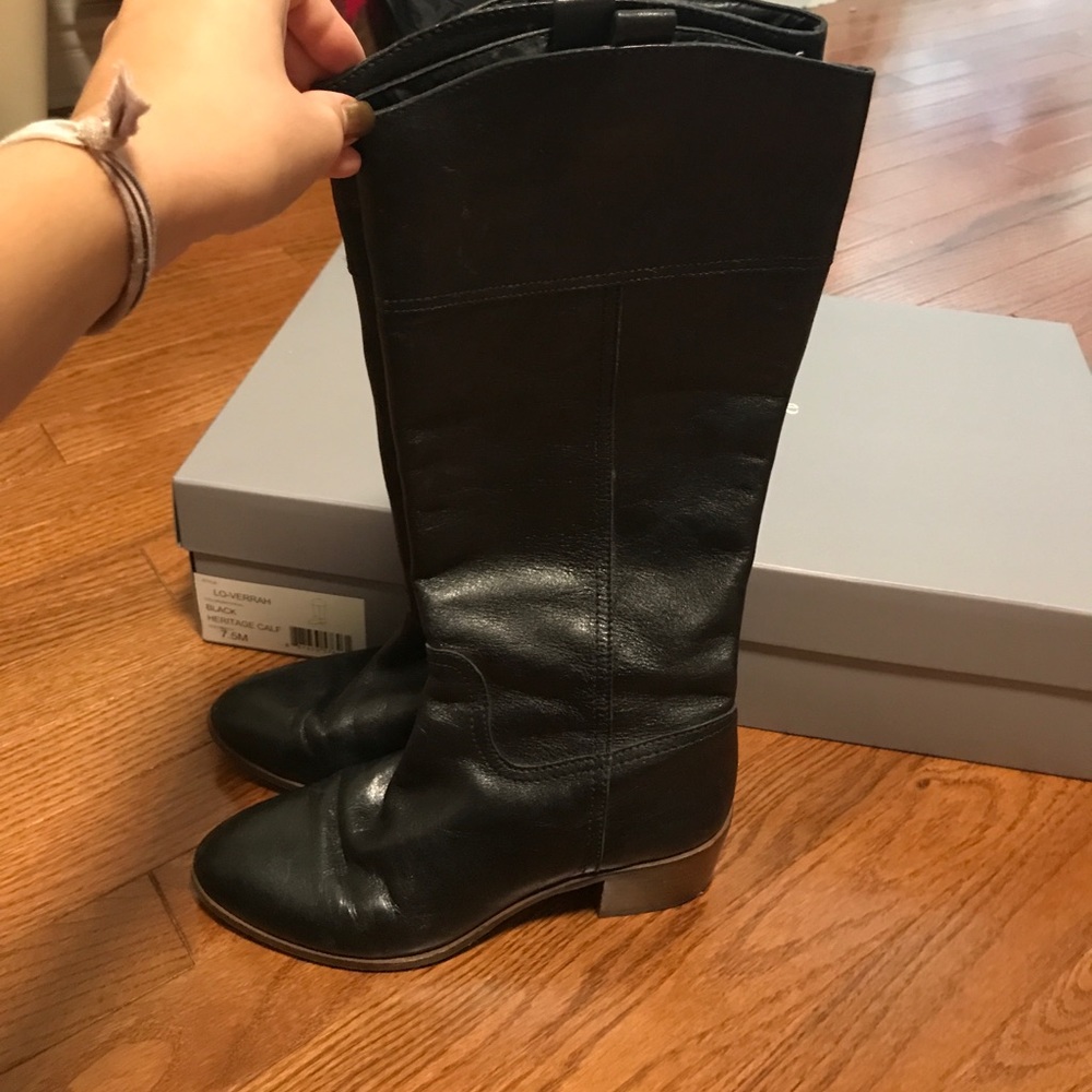 Tall black leather boots