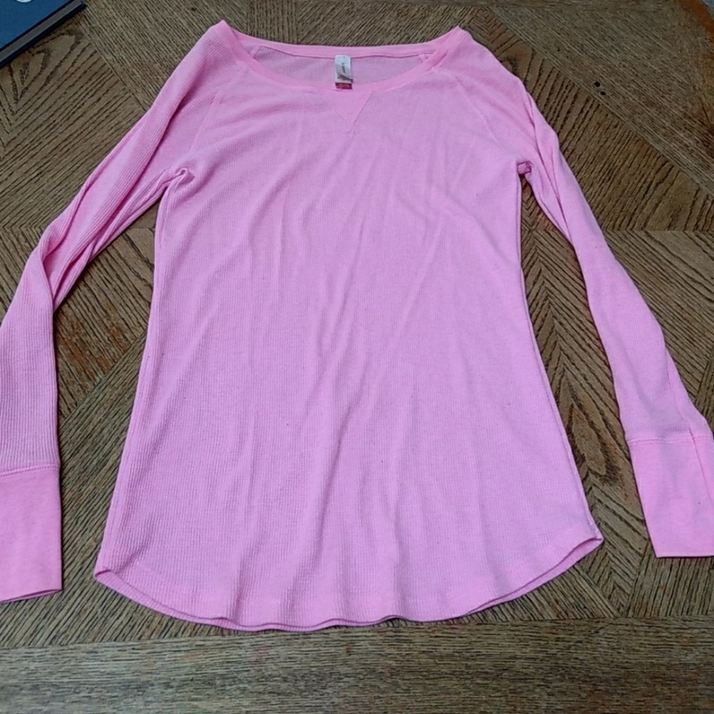 Pink long sleeve shirt.