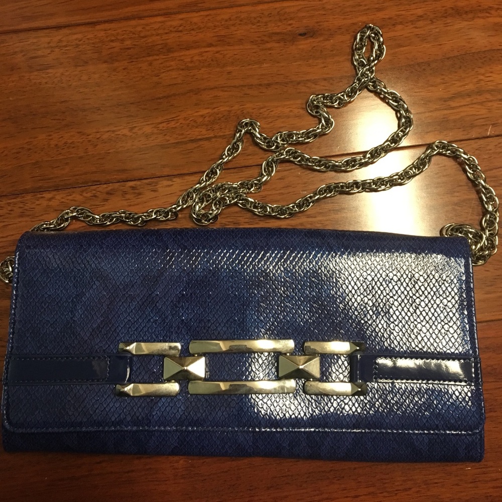 Faux blue leather clutch with strap