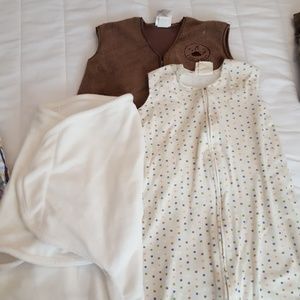 Two sleep sacks and one swaddle me wrap