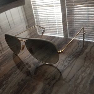 Authentic white aviator Ray-Bans.