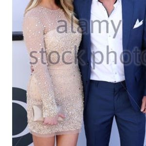 Beautiful nude Bebe sparkly long sleeve mini dress