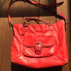 Bright orange coach bag