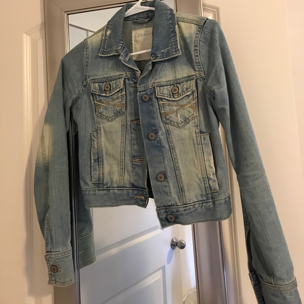 Distressed jean jacket