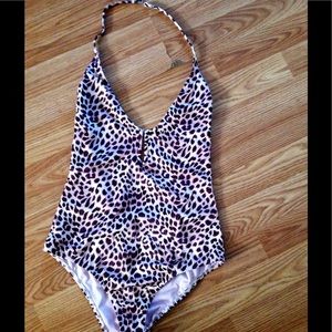 Victoria's Secret purple and cream bathing suit.