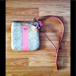 Coach pink and cream leather cross body.