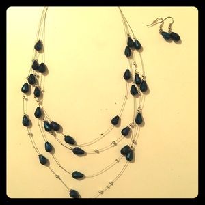 Matching blue earrings and necklace