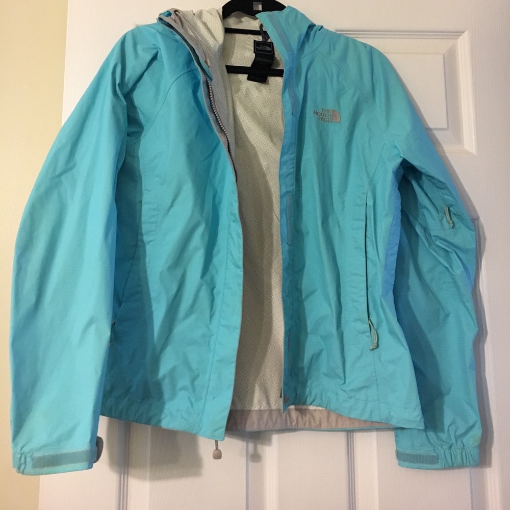 Turquoise North Face rain jacket