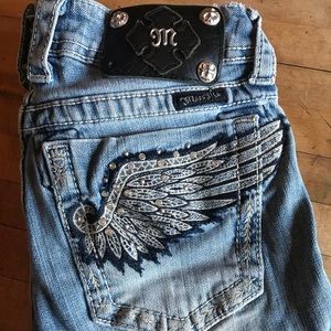 Miss Me’s size 25. Boot cut. Wing design.