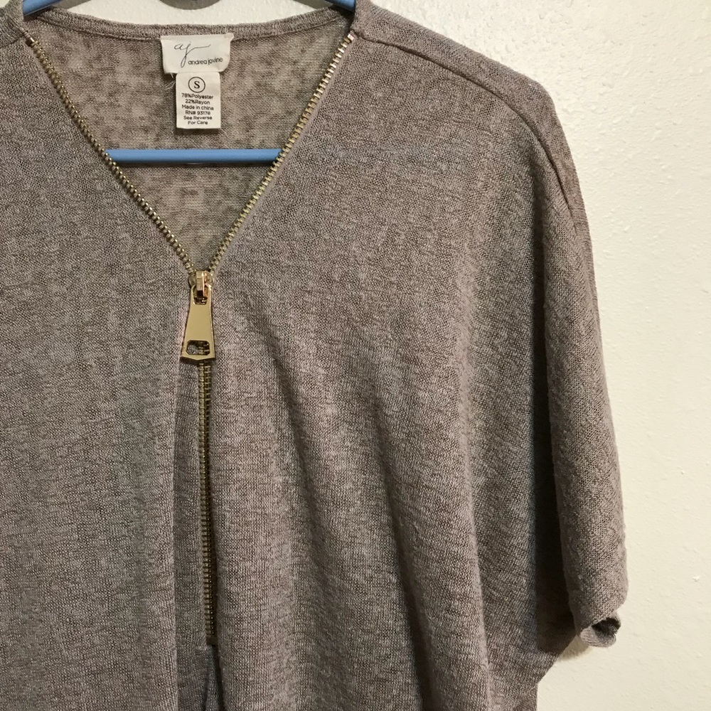 Poncho style with zipper