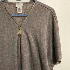 Poncho style with zipper