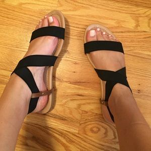 Never worn Stretchy sandals. Fits like a 7.5