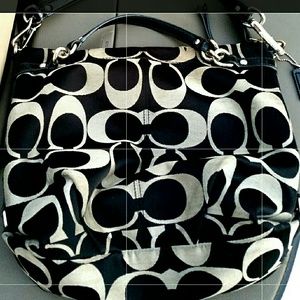 Coach purse with a few wear and tears