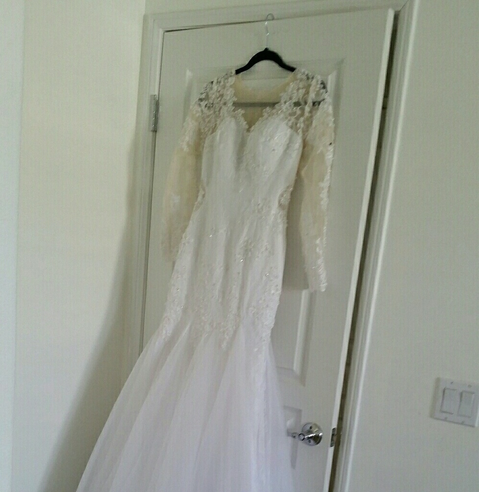 Trade reserved for Bella Wedding Dress