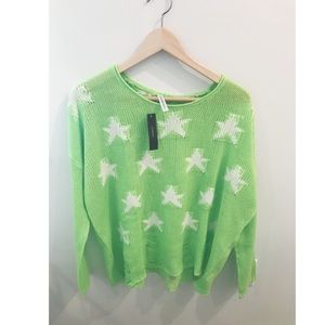 Women’s distressed star print sweater