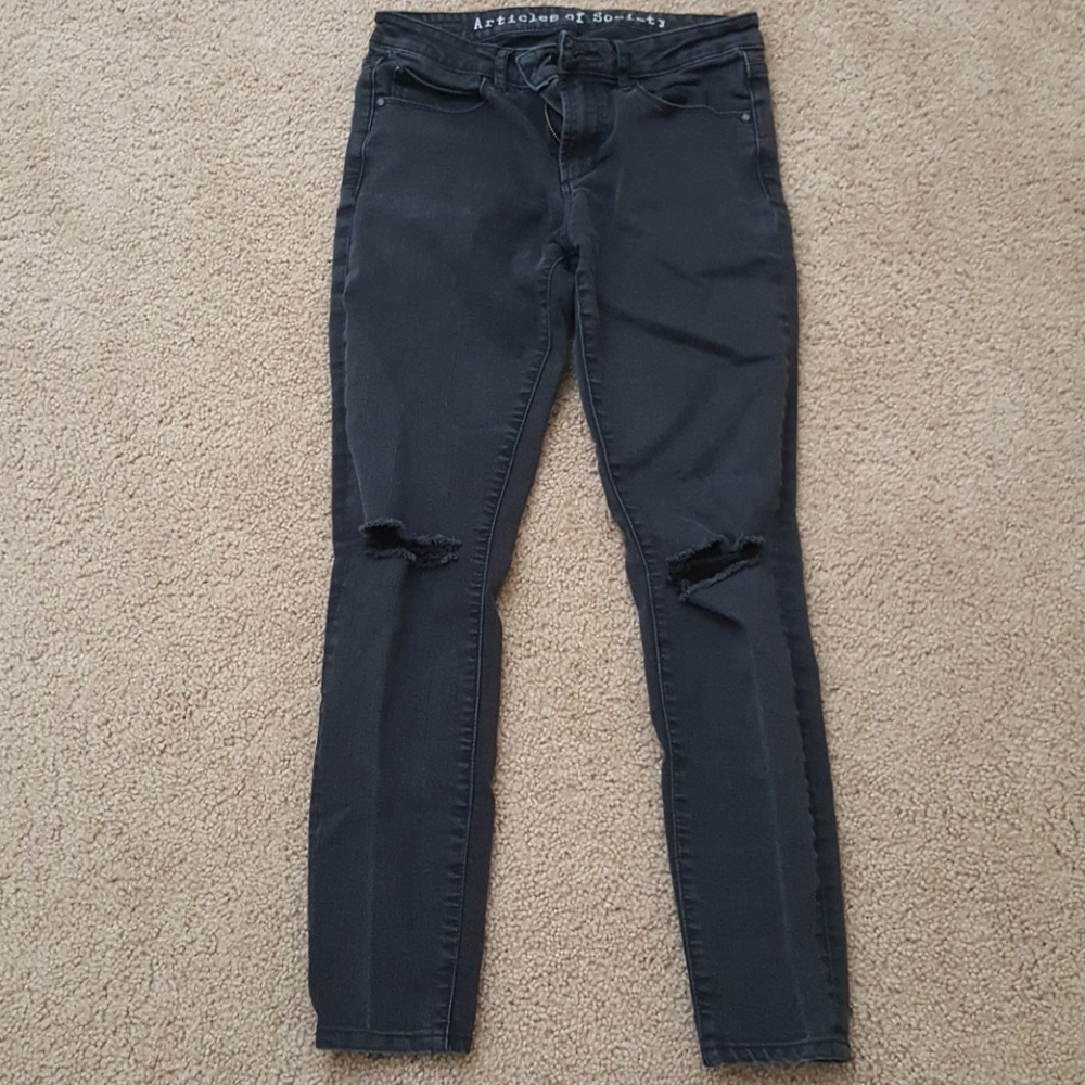 Black distressed skinny jeans