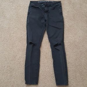 Black distressed skinny jeans