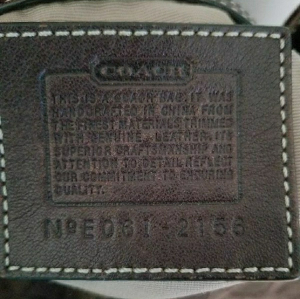 Dark Brown Coach Signature slouch bag