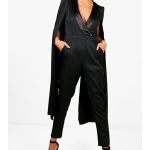 Cape jumpsuit new with tags