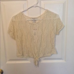 NWT cream lace crop top