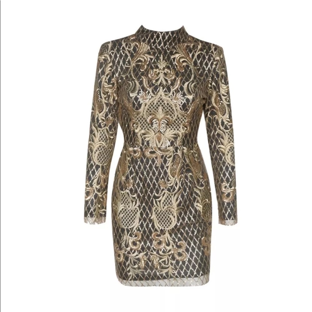 Sequin gold and black dress with long sleeves .