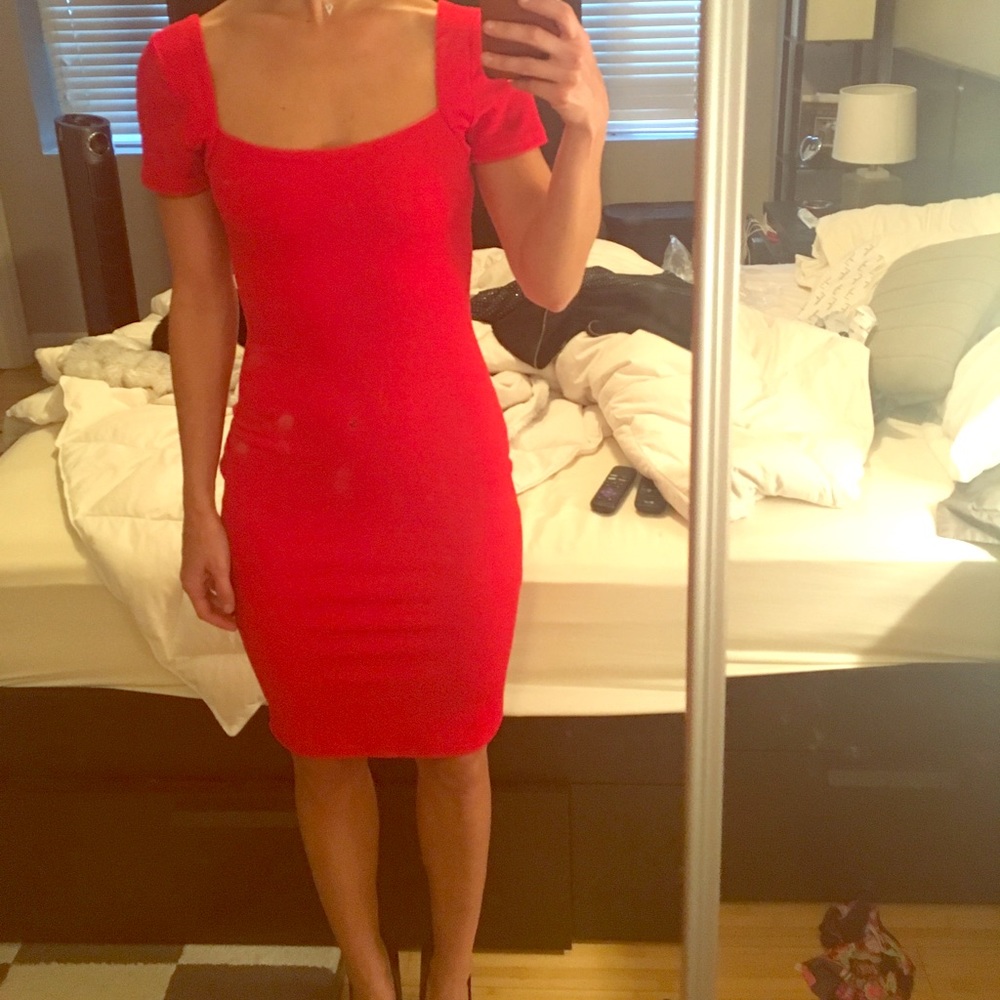 Beautiful, curve hugging red dress.   NWOT