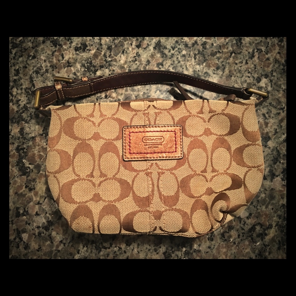 Small brown & Tan Coach clutch purse