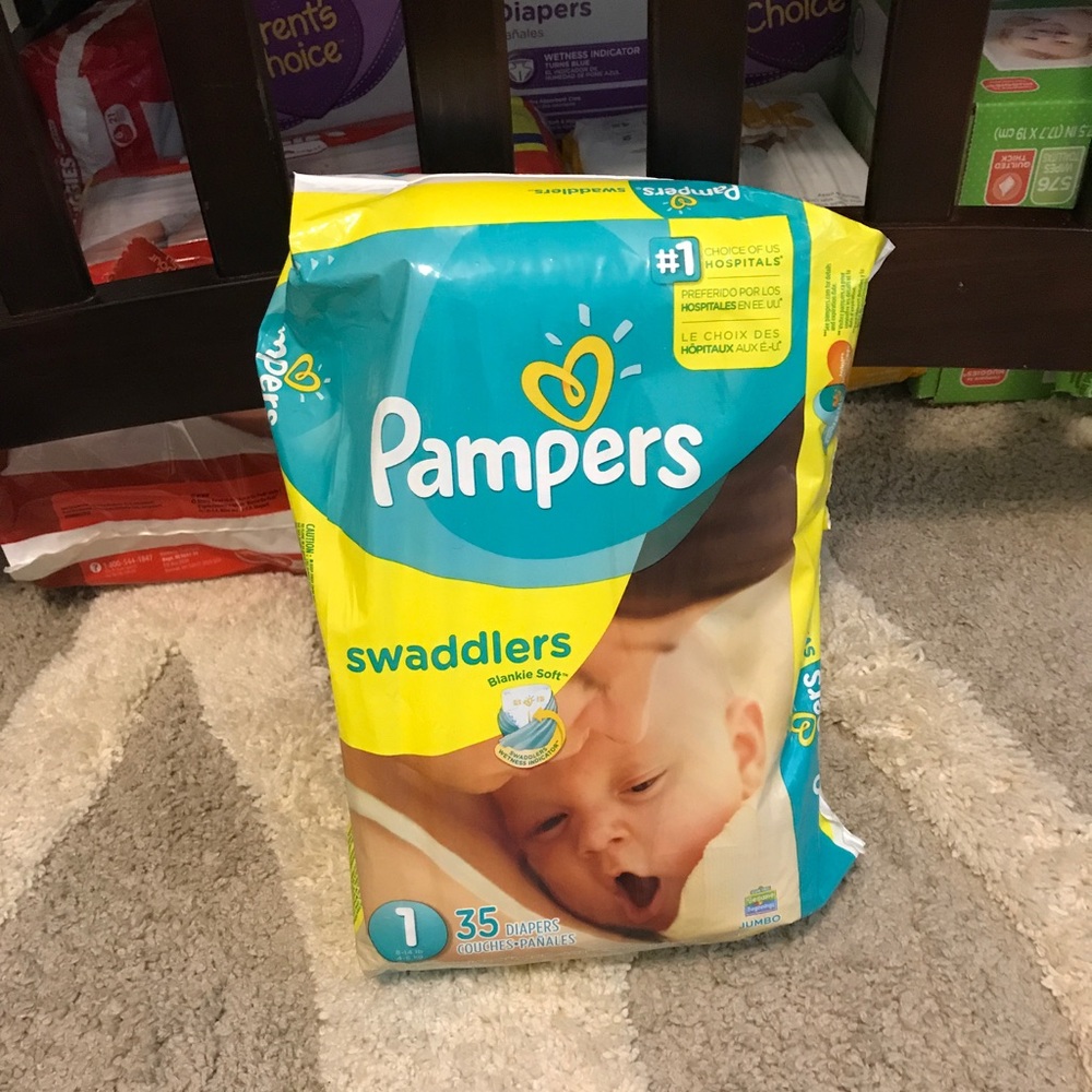 Brand new unopened size one pampers diapers