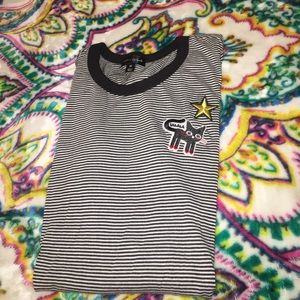 Black/white striped shirt cat emblem