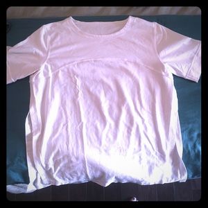 Three quarter sleeve work out top with side slits