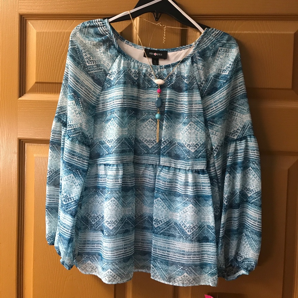 Blue and white shirt with necklace