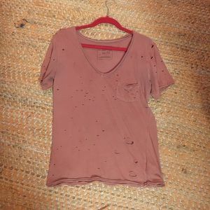 Orange ripped free people shirt