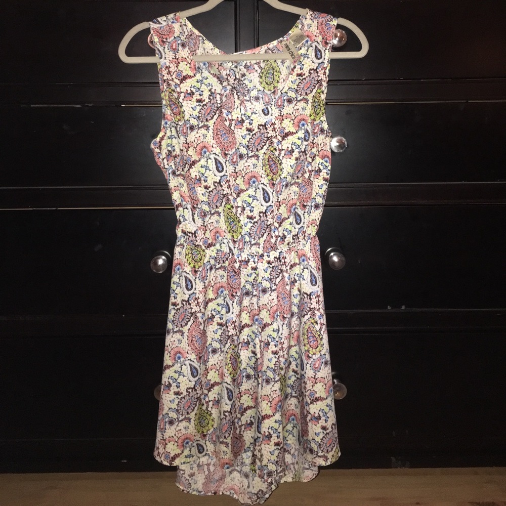Patterned rompers with open back!