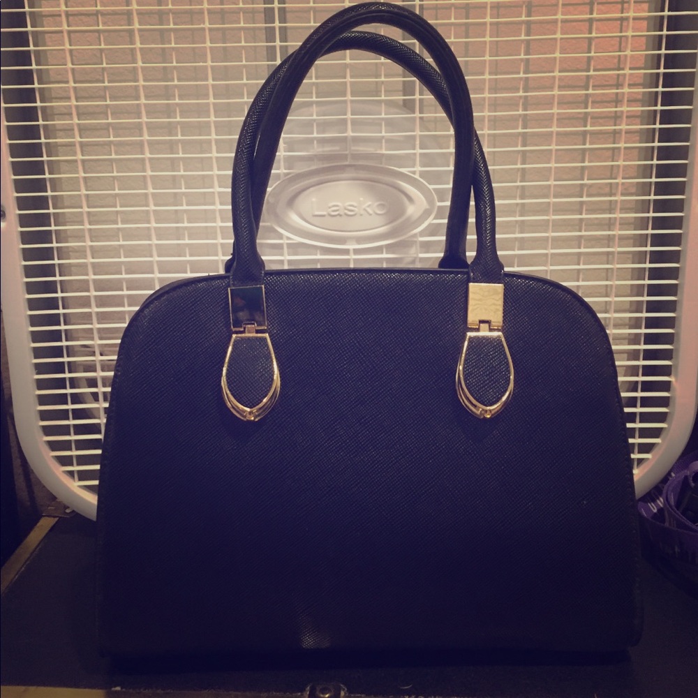 Black faux leather handbag