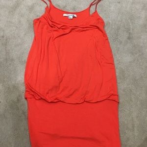 Orange tank with fitted bottom
