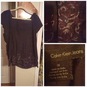 Black baby doll top. Purple embroidery on bottom