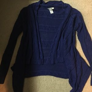 Bold blue asymmetrical sweater