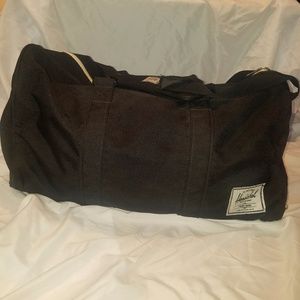 Black Herschel duffle bag