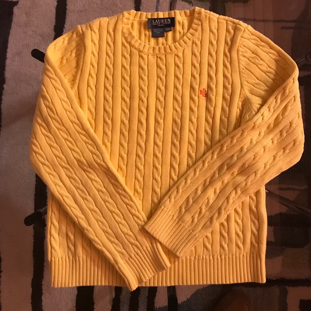 Yellow cable knit sweater.